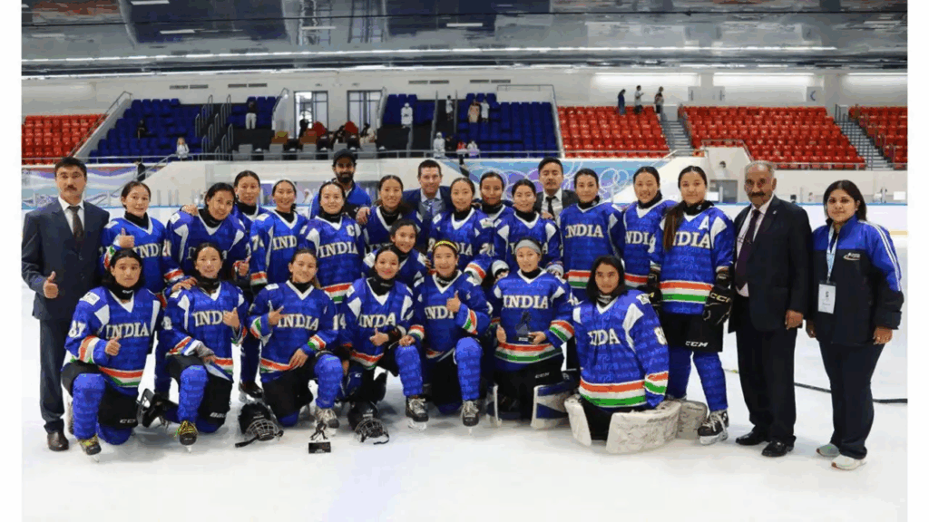 Indian women's ice hockey team celebrating with bronze medals at 2025 IIHF Asia Cup